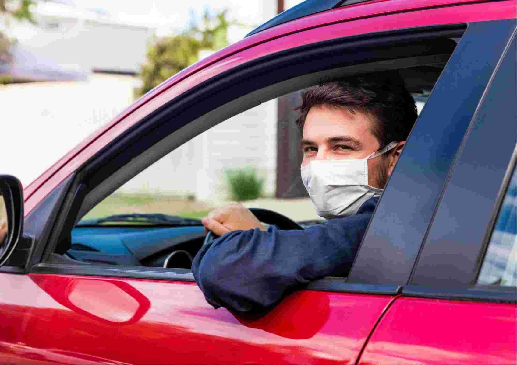 Man with face mask in car_bettercaremarket