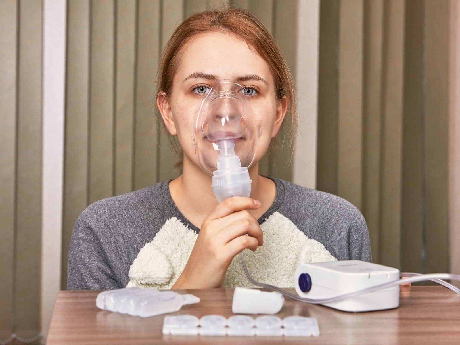 Woman with nebuliser mask_bettercaremarket